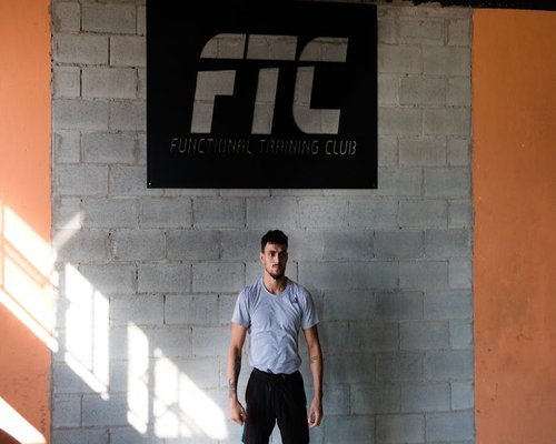 Portrait of Carlos M., fitness instructor specializing in functional force training